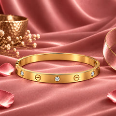 Imperio Lustre Screw Motif Clear Accent Gold Tone Luxury Bangle Bracelet